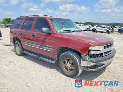 Czwarte zdjęcie samochodu z boku: 2003 CHEVROLET TAHOE VIN:1GNEC13Z23R291475 - miniatura