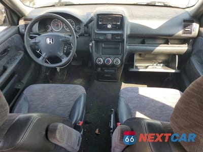 Zdjęcie 8 z 13 samochodu: 2002 HONDA CR-V LX VIN:JHLRD68432C009642 - miniatura
