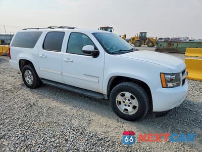 Czwarte zdjęcie samochodu z boku: 2011 CHEVROLET SUBURBAN K1500 LT VIN:1GNSKJE30BR210731 - miniatura