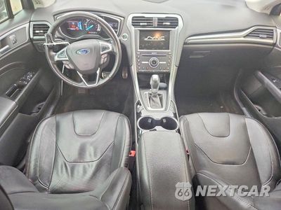 Zdjęcie 8 z 12 samochodu: 2016 FORD FUSION TITANIUM PHEV VIN:3FA6P0SU8GR189289 - miniatura
