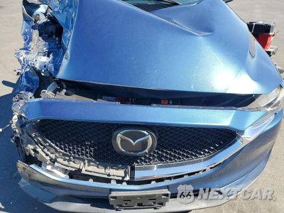 Zdjęcie 11 z 12 samochodu: 2020 MAZDA CX-5 TOURING VIN:JM3KFACM6L1822741 - miniatura