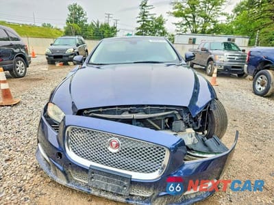 Piąte zdjęcie samochodu w środku: 2014 JAGUAR XJL PORTFOLIO VIN:SAJWA2GZXE8V62599 - miniatura