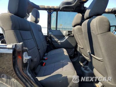 Zdjęcie 11 z 14 samochodu: 2012 JEEP WRANGLER UNLIMITED SAHARA VIN:1C4BJWEG7CL105202 - miniatura