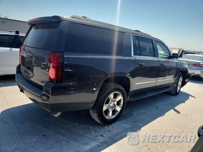 Trzecie zdjęcie samochodu z tyłu: 2016 CHEVROLET SUBURBAN C1500 LT VIN:1GNSCHKC1GR276593 - miniatura