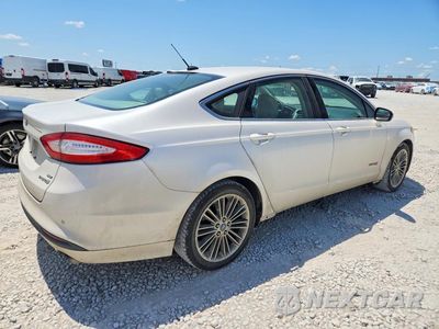 Trzecie zdjęcie samochodu z tyłu: 2013 FORD FUSION SE HYBRID VIN:3FA6P0LU0DR260351 - miniatura