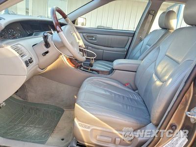 Zdjęcie 7 z 12 samochodu: 2003 TOYOTA AVALON XLS VIN:4T1BF28B33U297041 - miniatura