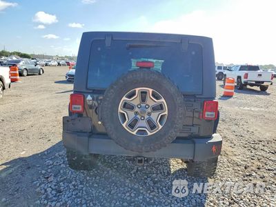 Zdjęcie 6 z 12 samochodu: 2014 JEEP WRANGLER UNLIMITED RUBICON VIN:1C4BJWFG8EL322288 - miniatura