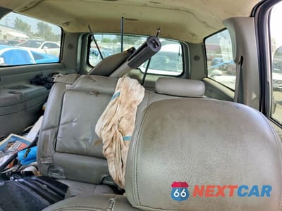 Zdjęcie 10 z 13 samochodu: 2003 GMC YUKON XL C1500 VIN:1GKEC16T13J145569 - miniatura