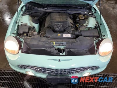 Zdjęcie 11 z 12 samochodu: 2004 FORD THUNDERBIRD VIN:1FAHP60A04Y101885 - miniatura