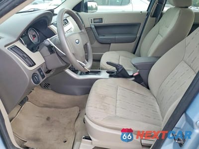 Zdjęcie 7 z 12 samochodu: 2008 FORD FOCUS SE VIN:1FAHP35N78W264643 - miniatura