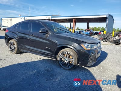 Czwarte zdjęcie samochodu z boku: 2015 BMW X4 XDRIVE28I VIN:5UXXW3C51F0F88779 - miniatura