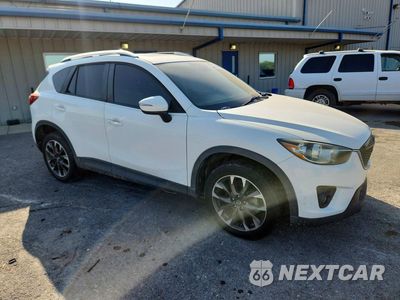 Czwarte zdjęcie samochodu z boku: 2015 MAZDA CX-5 GT VIN:JM3KE2DYXF0486919 - miniatura