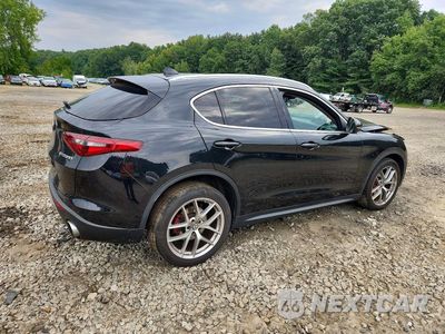 Trzecie zdjęcie samochodu z tyłu: 2018 ALFA ROMEO STELVIO TI LUXURY VIN:ZASFAKRN2J7C21147 - miniatura