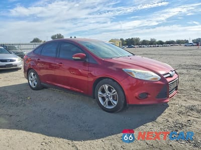 Czwarte zdjęcie samochodu z boku: 2013 FORD FOCUS SE VIN:1FADP3F27DL184757 - miniatura