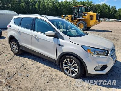 Czwarte zdjęcie samochodu z boku: 2018 FORD ESCAPE SEL VIN:1FMCU9HDXJUB23016 - miniatura