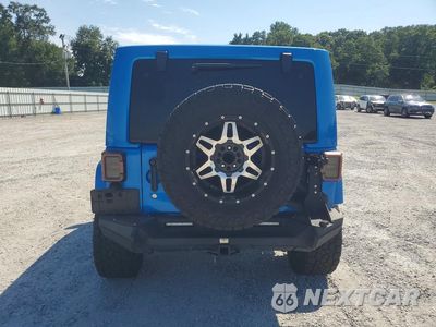 Zdjęcie 6 z 12 samochodu: 2014 JEEP WRANGLER UNLIMITED SAHARA VIN:1C4BJWEG7EL158713 - miniatura