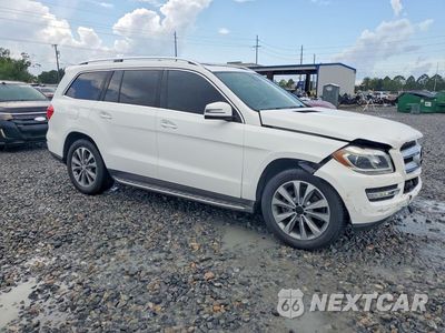 Czwarte zdjęcie samochodu z boku: 2015 MERCEDES-BENZ GL 450 4MATIC VIN:4JGDF6EEXFA519885 - miniatura
