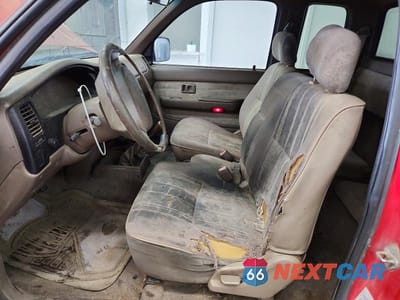Zdjęcie 7 z 12 samochodu: 2000 TOYOTA TACOMA BASE VIN:4TAVL52N3YZ659597 - miniatura
