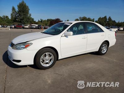 2004 TOYOTA CAMRY LE JTDBE32K240264269 - główne zdjęcie licytacji z USA - miniatura