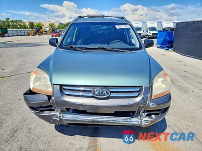 Piąte zdjęcie samochodu w środku: 2007 KIA SPORTAGE LX VIN:KNDJF724477434936 - miniatura