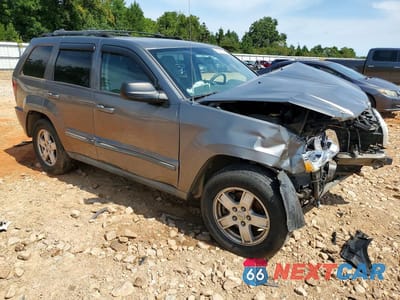 Czwarte zdjęcie samochodu z boku: 2007 JEEP GRAND CHEROKEE LAREDO VIN:1J8GR48K37C649231 - miniatura