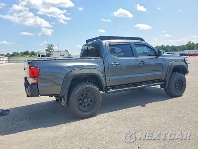 Trzecie zdjęcie samochodu z tyłu: 2017 TOYOTA TACOMA TRD SPORT VIN:3TMCZ5AN4HM119611 - miniatura