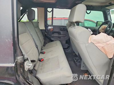 Zdjęcie 10 z 12 samochodu: 2008 JEEP WRANGLER UNLIMITED SAHARA VIN:1J8GA59178L552845 - miniatura