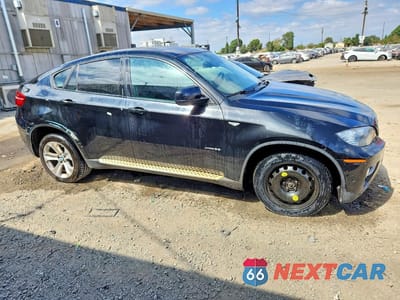 Czwarte zdjęcie samochodu z boku: 2014 BMW X6 XDRIVE35I VIN:5UXFG2C57E0C45752 - miniatura