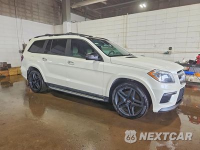 Czwarte zdjęcie samochodu z boku: 2014 MERCEDES-BENZ GL 550 4MATIC VIN:4JGDF7DE7EA377680 - miniatura