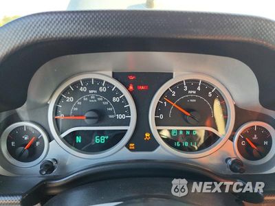 Zdjęcie 9 z 12 samochodu: 2010 JEEP WRANGLER UNLIMITED RUBICON VIN:1J4HA6H18AL181620 - miniatura