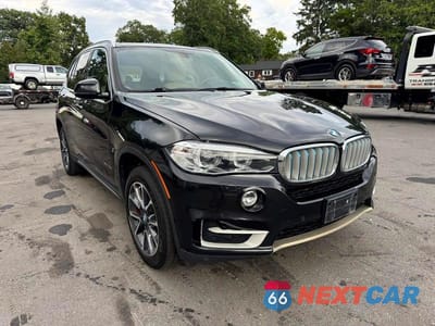 Czwarte zdjęcie samochodu z boku: 2017 BMW X5 XDR40E VIN:5UXKT0C31H0S81452 - miniatura