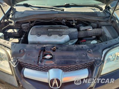 Zdjęcie 12 z 13 samochodu: 2005 ACURA MDX TOURING VIN:2HNYD18695H549733 - miniatura
