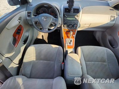 Zdjęcie 8 z 12 samochodu: 2009 TOYOTA COROLLA XLE VIN:1NXBU40E19Z111920 - miniatura