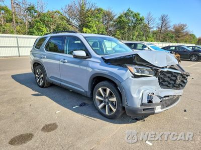 Czwarte zdjęcie samochodu z boku: 2025 HONDA PILOT TOURING VIN:5FNYG1H72SB056144 - miniatura