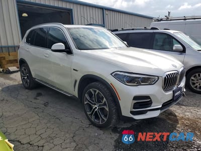 Czwarte zdjęcie samochodu z boku: 2022 BMW X5 XDRIVE45E VIN:5UXTA6C00N9L31560 - miniatura