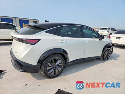 Trzecie zdjęcie samochodu z tyłu: 2023 NISSAN ARIYA ENGAGE VIN:JN1AF0BA1PM401507 - miniatura