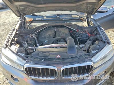 Zdjęcie 12 z 13 samochodu: 2014 BMW X5 SDRIVE35I VIN:5UXKR2C54E0H32383 - miniatura