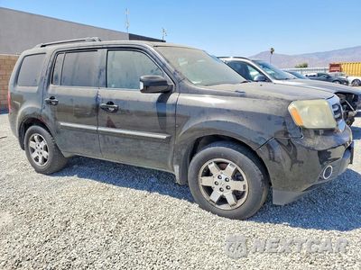 Czwarte zdjęcie samochodu z boku: 2009 HONDA PILOT TOURING VIN:5FNYF48819B039648 - miniatura