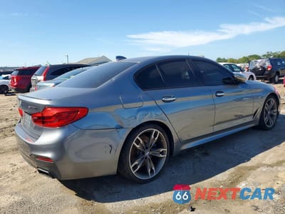 Trzecie zdjęcie samochodu z tyłu: 2018 BMW M550XI VIN:WBAJB9C5XJB035853 - miniatura