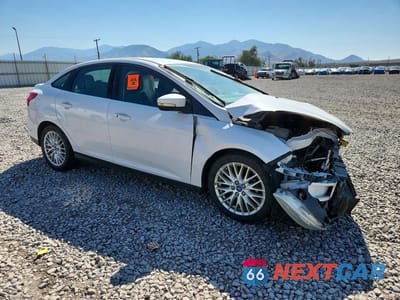 Czwarte zdjęcie samochodu z boku: 2013 FORD FOCUS TITANIUM VIN:1FADP3J25DL263593 - miniatura