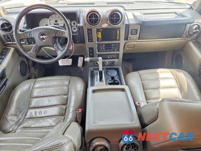 Zdjęcie 8 z 13 samochodu: 2004 HUMMER H2 VIN:5GRGN23U64H117419 - miniatura