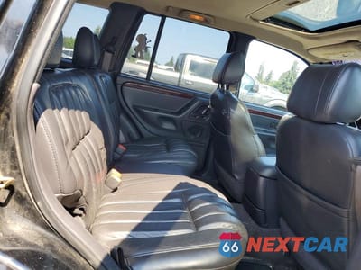 Zdjęcie 11 z 13 samochodu: 2000 JEEP GRAND CHEROKEE LIMITED VIN:1J4GW58N8YC280409 - miniatura