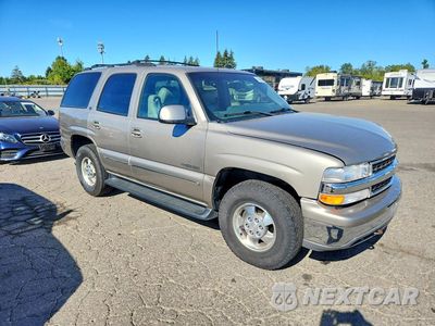 Czwarte zdjęcie samochodu z boku: 2001 CHEVROLET TAHOE K1500 VIN:1GNEK13T41J110161 - miniatura