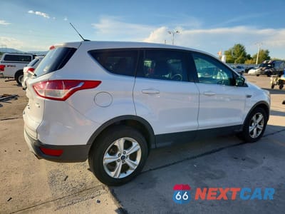 Trzecie zdjęcie samochodu z tyłu: 2016 FORD ESCAPE SE VIN:1FMCU9G97GUA32212 - miniatura