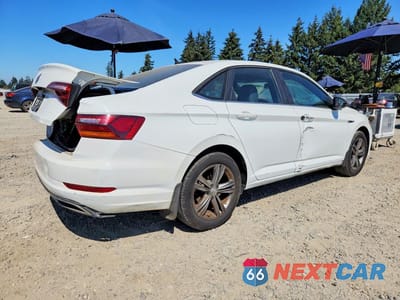 Trzecie zdjęcie samochodu z tyłu: 2019 VOLKSWAGEN JETTA S VIN:3VWC57BU7KM137098 - miniatura