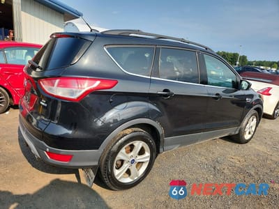 Trzecie zdjęcie samochodu z tyłu: 2014 FORD ESCAPE SE VIN:1FMCU9G98EUE04749 - miniatura