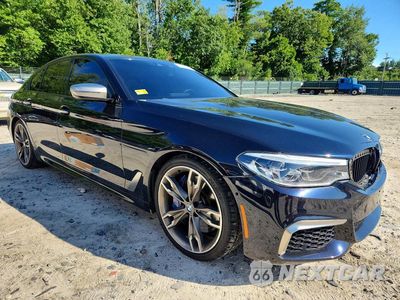Czwarte zdjęcie samochodu z boku: 2018 BMW M550XI VIN:WBAJB9C56JB286966 - miniatura