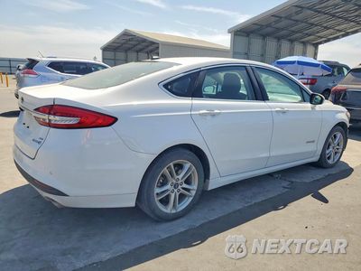 Trzecie zdjęcie samochodu z tyłu: 2018 FORD FUSION SE HYBRID VIN:3FA6P0LU4JR171541 - miniatura