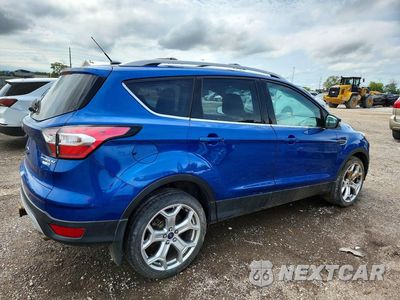 Trzecie zdjęcie samochodu z tyłu: 2017 FORD ESCAPE TITANIUM VIN:1FMCU9J99HUC44233 - miniatura