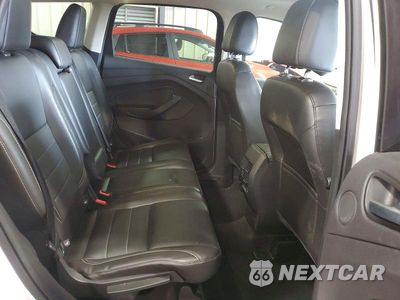 Zdjęcie 10 z 13 samochodu: 2016 FORD ESCAPE TITANIUM VIN:1FMCU9J98GUA39419 - miniatura